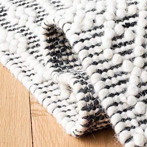 SAFAVIEH Natura Collection Area Rug - 9' x 12', Ivory & Black, Ha...