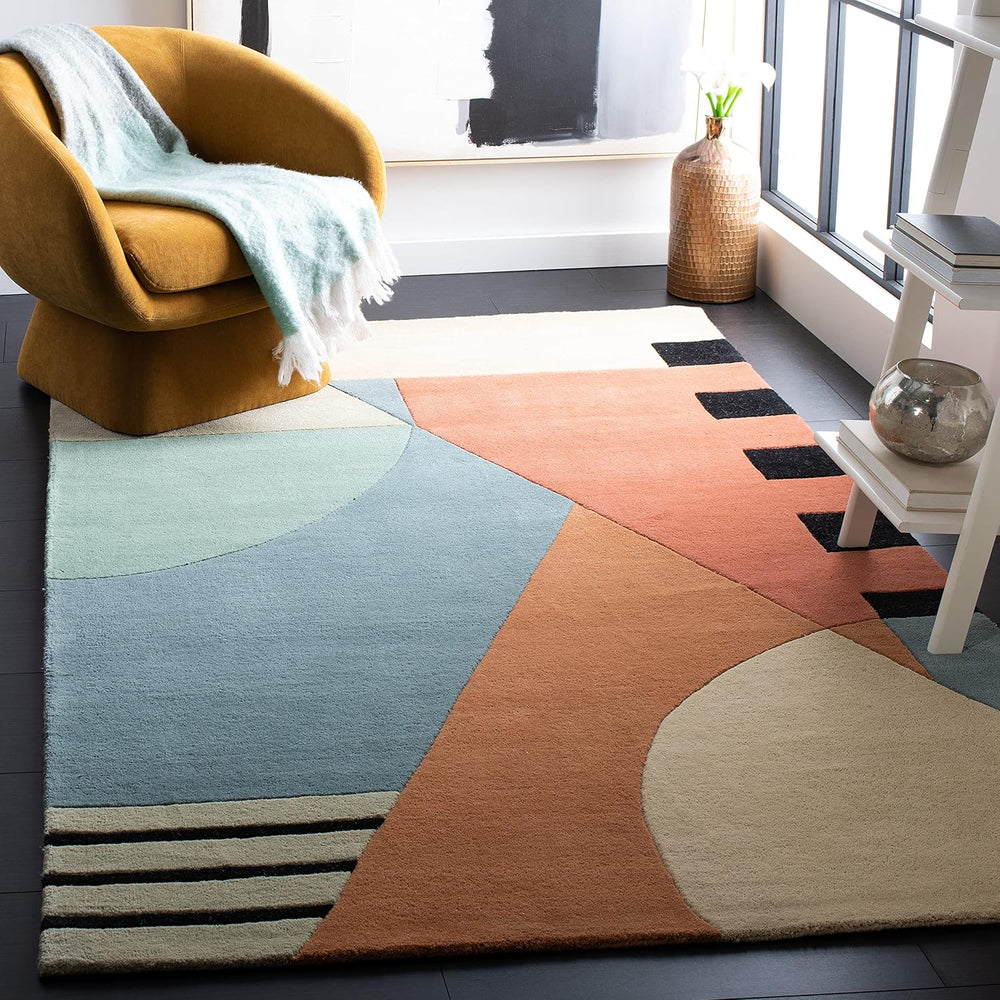 SAFAVIEH Rodeo Drive Collection Area Rug - 5' x 8', Gold, Handmade Mi...