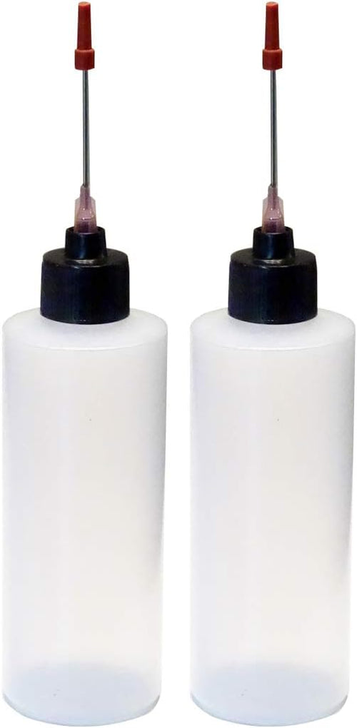 2-4oz Plastic Squeeze Bottles by Unknown