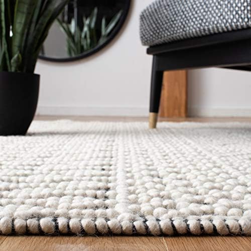 SAFAVIEH Natura Collection Area Rug - 9' x 12', Ivory & Black, Ha...
