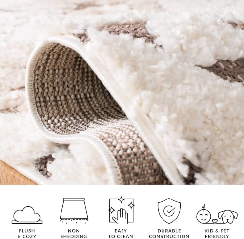 SAFAVIEH Moroccan Tassel Shag Collection Area Rug - 6'7" x 9'2&q...