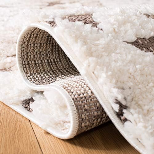 SAFAVIEH Moroccan Tassel Shag Collection Area Rug - 6'7" x 9'2&q...