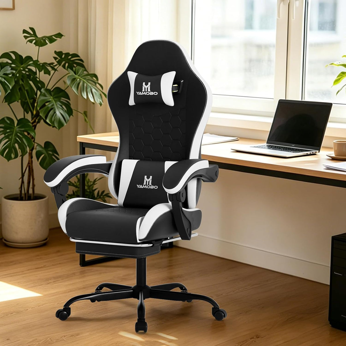 gaming chair, computer office chair with footrest, adjustable shown in use