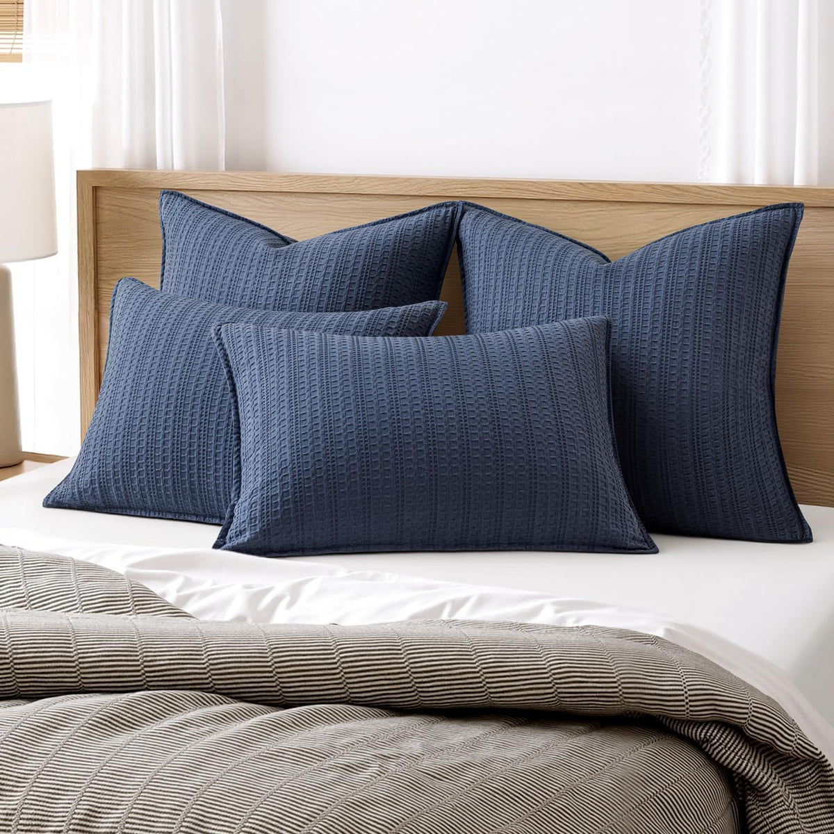 decorative waffle pillow shams king size 20x36 navy shown in use
