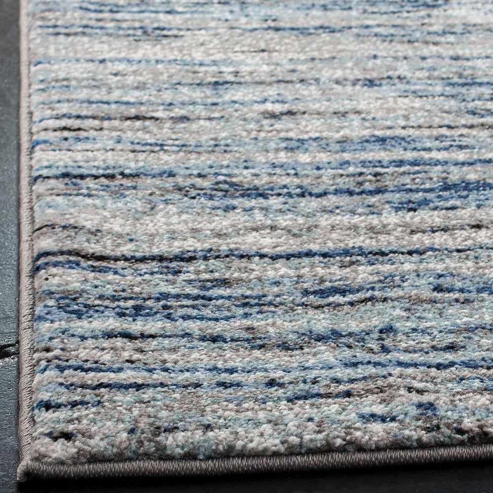 SAFAVIEH Galaxy Collection Area Rug - 9' x 12', Blue & Grey, Mode...