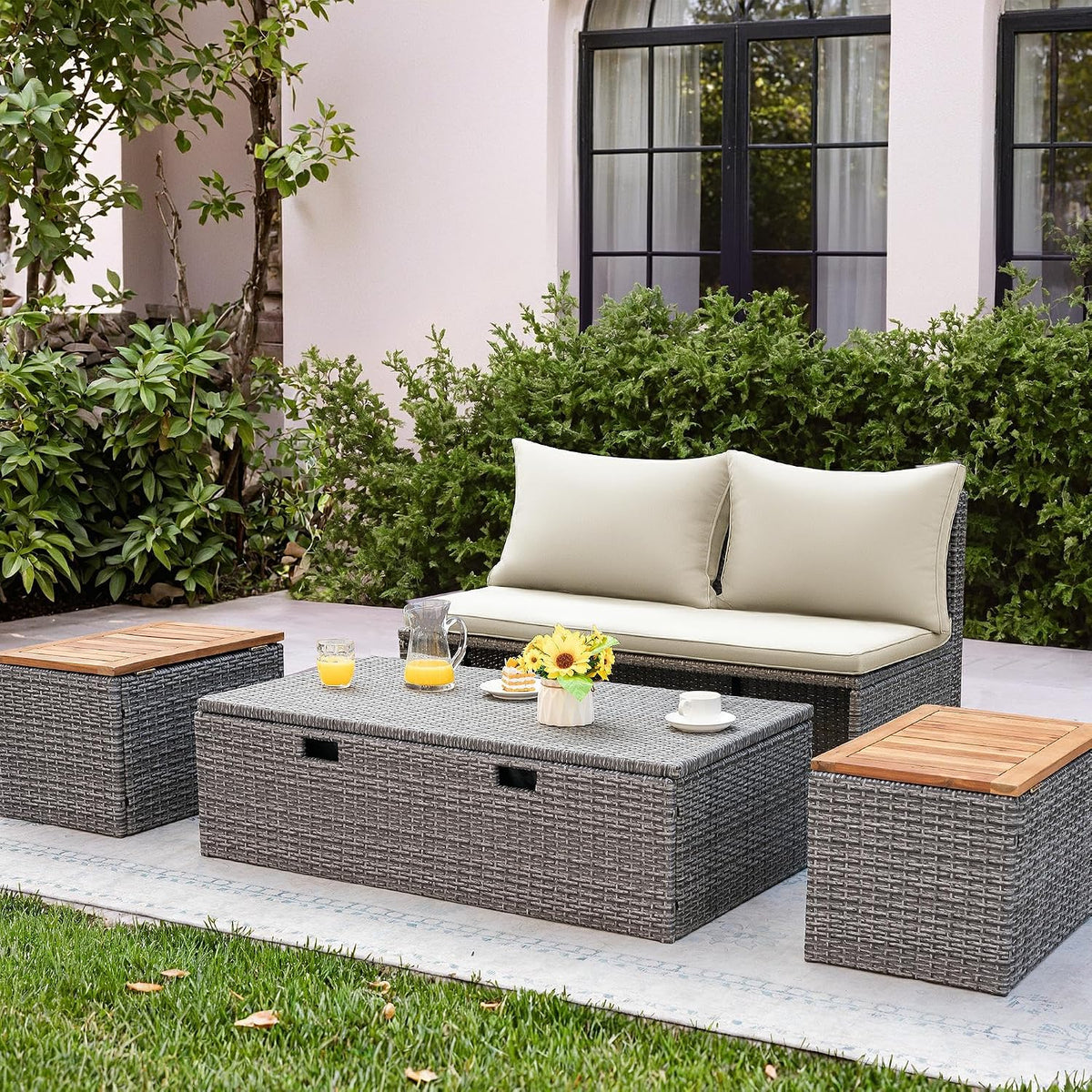 flamaker outdoor rattan daybed with 2 side tables shown in use