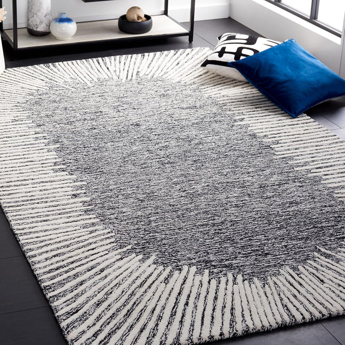 SAFAVIEH Abstract Wool Area Rug 5x8, Bordered Black & Ivory ABT478Z