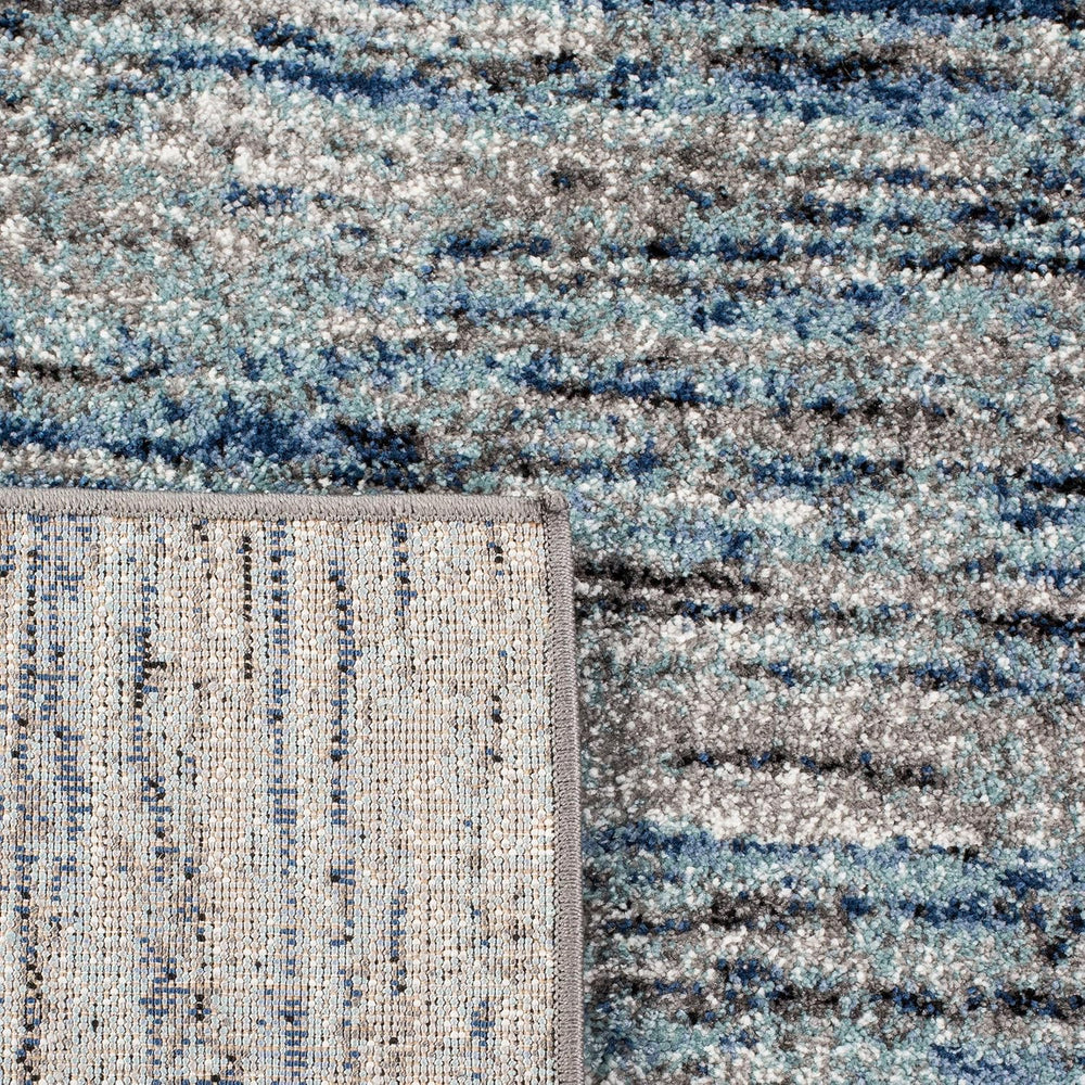 SAFAVIEH Galaxy Collection Area Rug - 9' x 12', Blue & Grey, Mode...