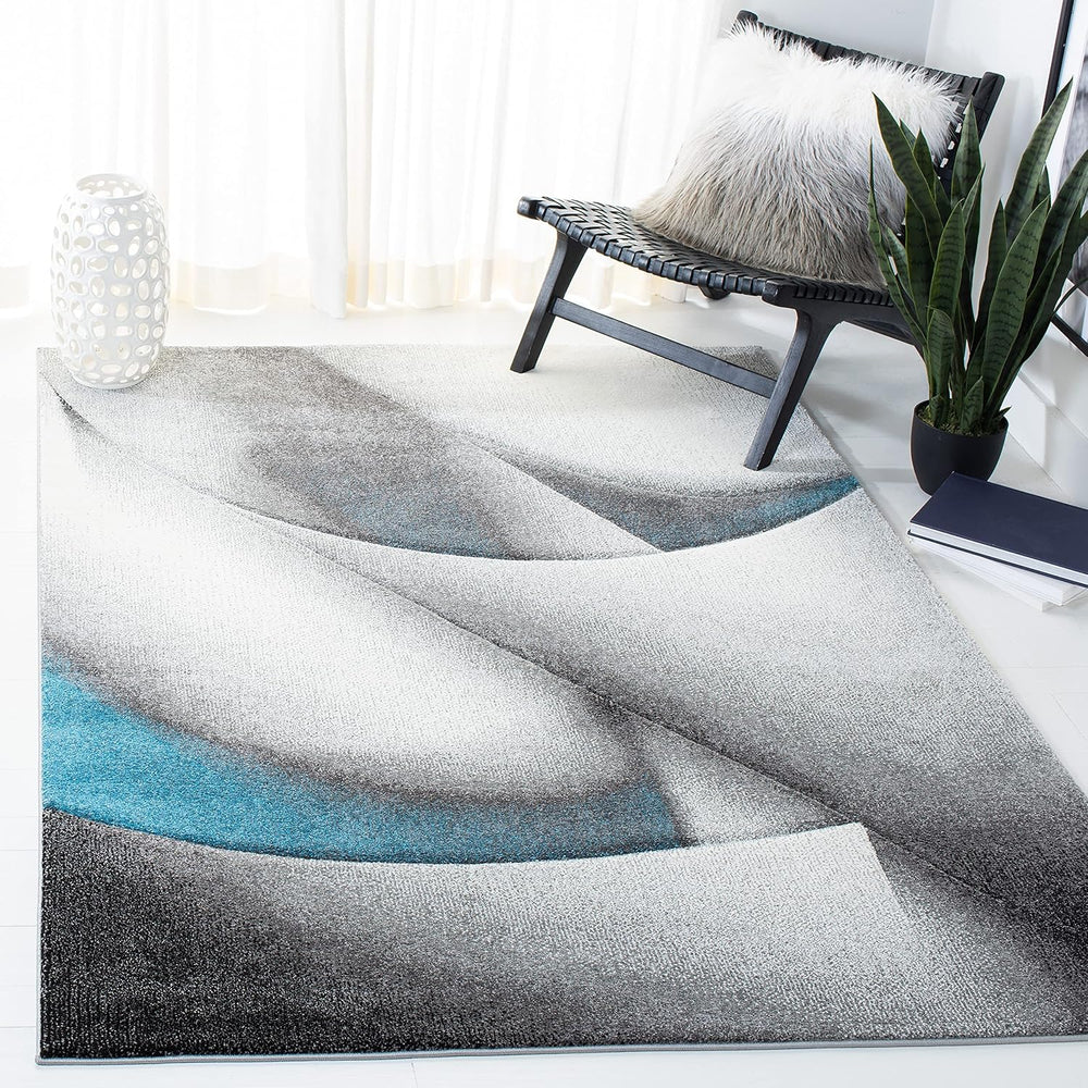 SAFAVIEH Hollywood Collection Area Rug - 6'7" x 9', Grey & B...
