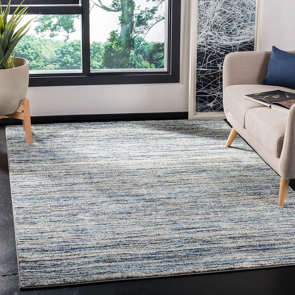 SAFAVIEH Galaxy Collection Area Rug - 9' x 12', Blue & Grey, Mode...